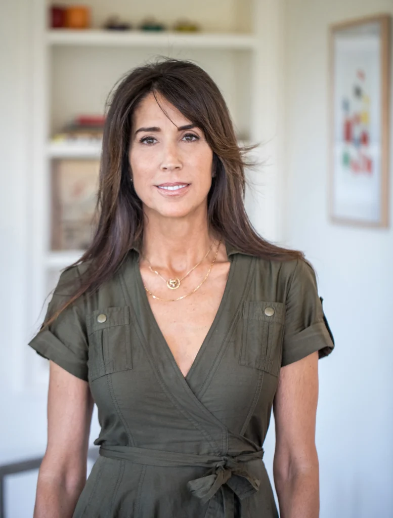 Victoria Hitchcock wearing a green dress