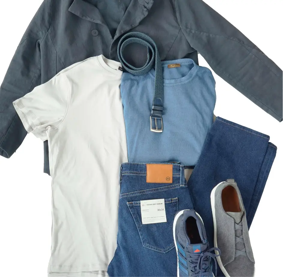 outfit laid out with jeans, tees, sneakers